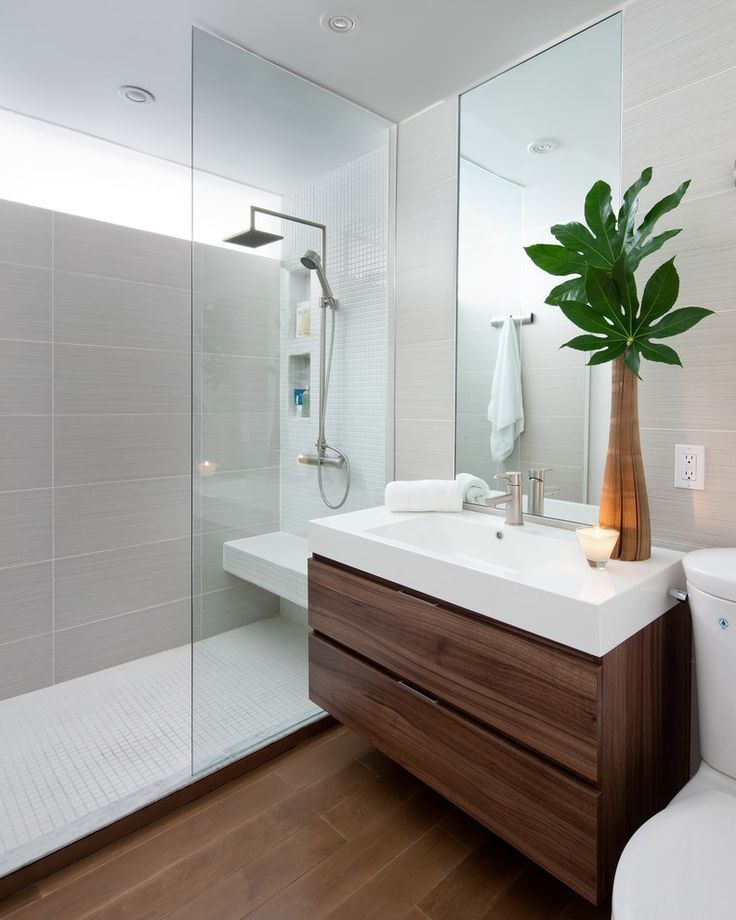 Điểm nhấn chậu cây xanh chính là yếu tố giúp trang trí không gian phòng tắm trở nên hiện đại