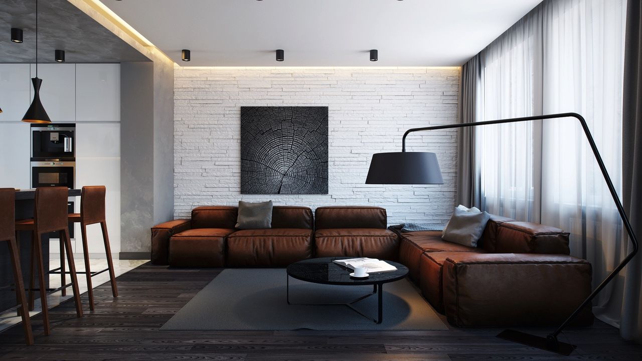 Bộ sofa chất liệu da khiến căn phòng trở nên sang trọng và hiện đại hơn rất nhiều