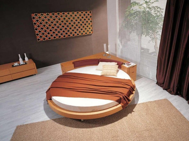 Kiểu mẫu giường gỗ tròn với thiết kế lạ mắt giúp không gian ấn tượng