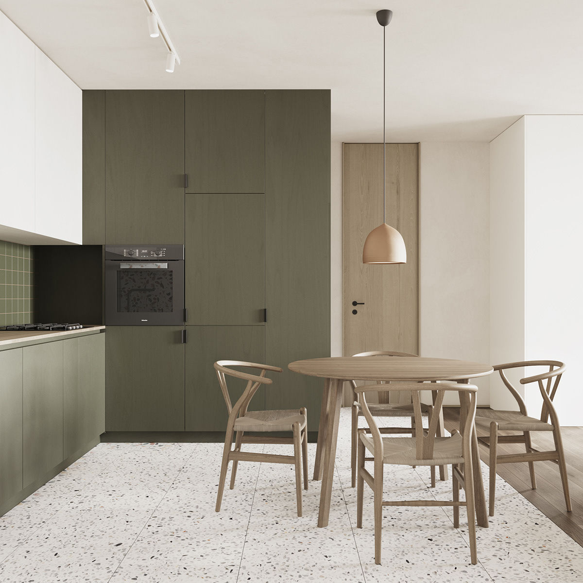 Bếp sử dụng thêm tông xanh lục thẫm tạo điểm nhấn màu sắc cho căn hộ