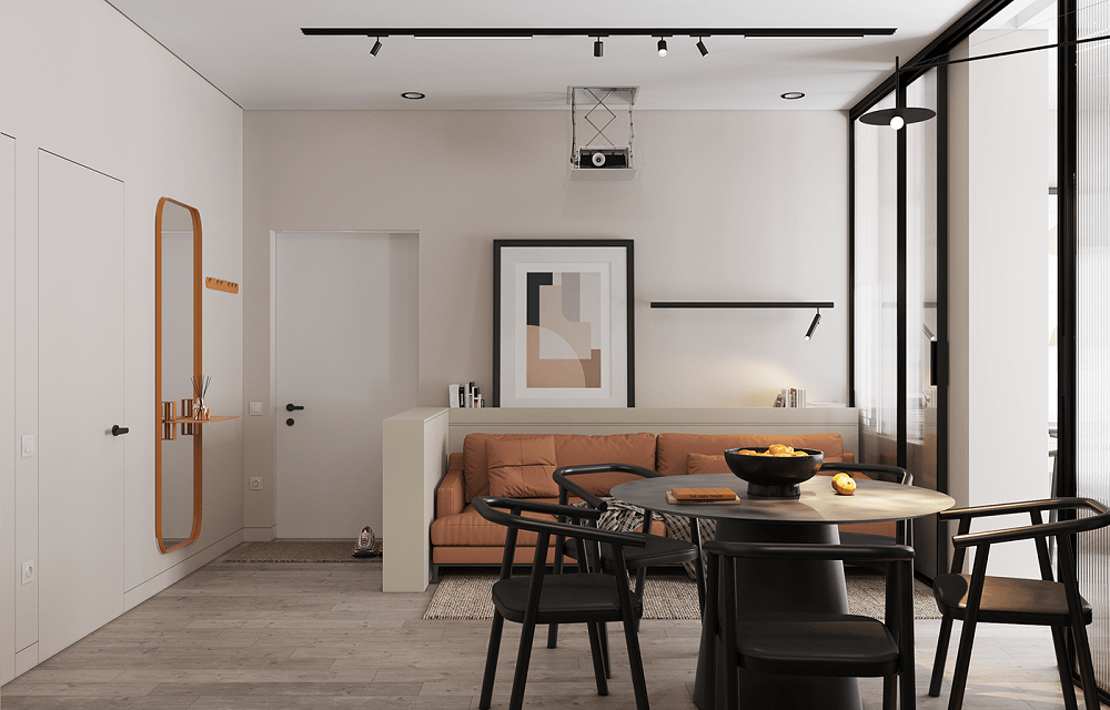 Ghế sofa màu cam làm điểm nhấn phòng khách căn hộ chung cư 45m2 cùng tông với gương treo