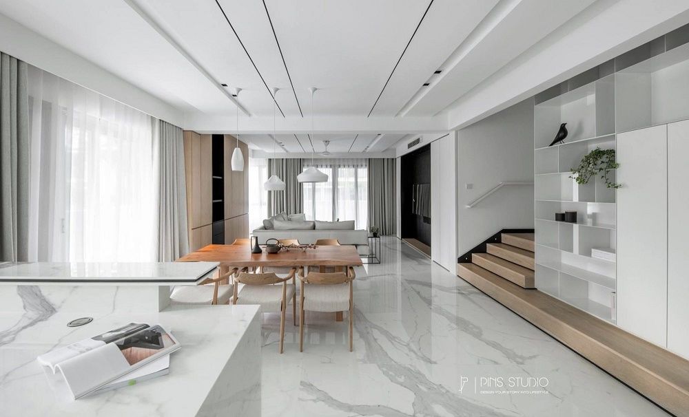 Đá cẩm thạch trắng bóng dùng cho sàn nhà, bàn bếp, quầy bar bếp giúp không gian rộng rãi