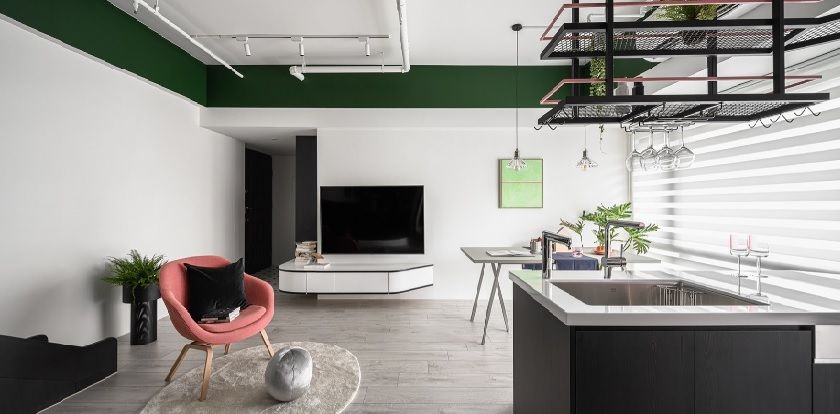 Các gam màu trắng, đen và xanh lá đậm tạo nên phong cách hiện đại, tươi mới cho căn hộ